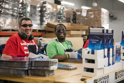 Brian assembling boxes when he first started working at Lighthouse Works in the supply chain division