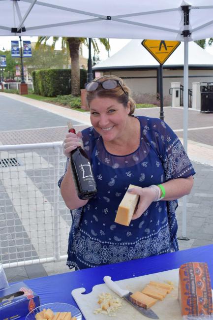 Tonda Corrente at her Wine and Cheese tasting booth at the Sight & Sole Walk