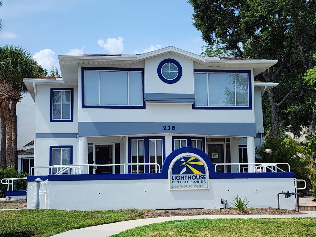 The Lighthouse Central Florida building in 2026. The outside is painted brighter colors with a clear sidewalk and ramps.
