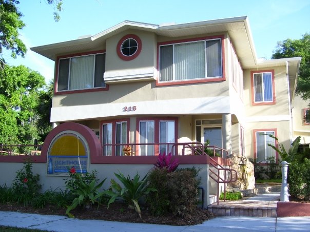 The Lighthouse Central Florida building in 2008. The outside is nicely landscaped and the building is painted in dark colors.