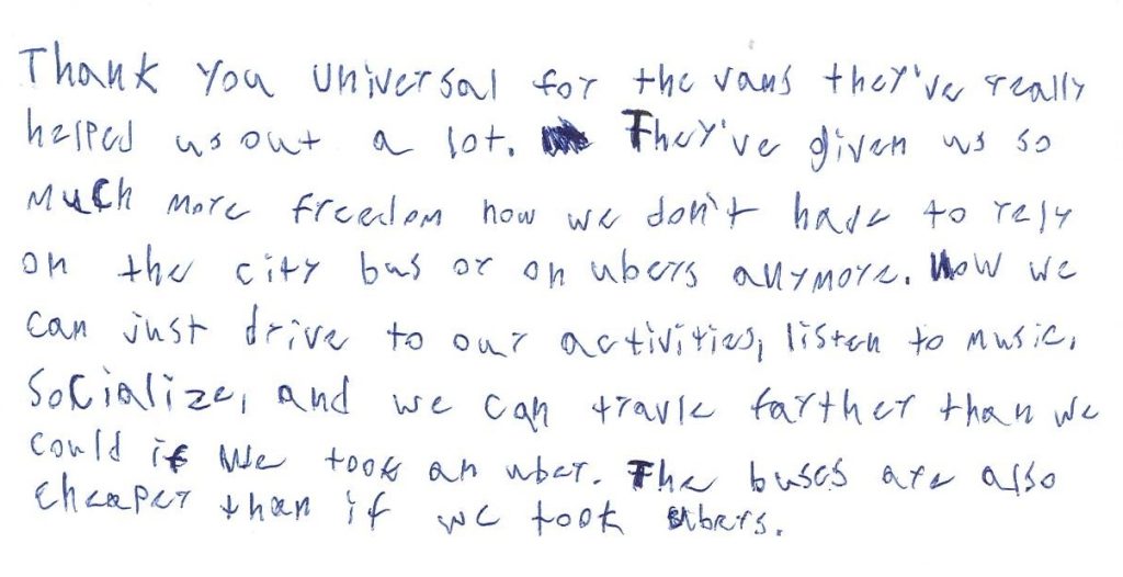 Sharp-19_20251222_095819 Handwritten note reads: “Thank you Universal for the vans—they’ve really helped us out a lot. They’ve given us more freedom so we don’t have to rely on city buses or Ubers anymore. Now we can drive to activities, listen to music, socialize, and travel farther. The buses are also cheaper than taking Ubers.”